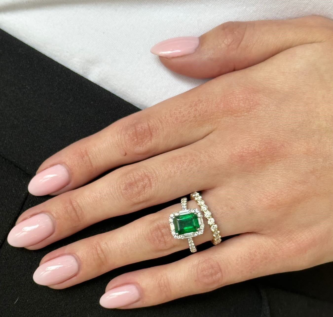 emerald ring with diamond accents and diamond band