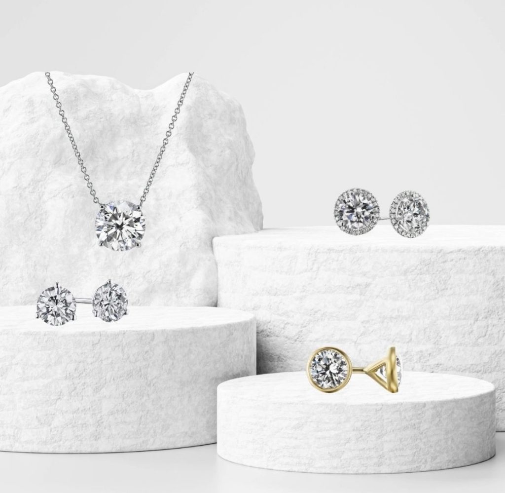diamond stud earrings and diamond solitaire necklace