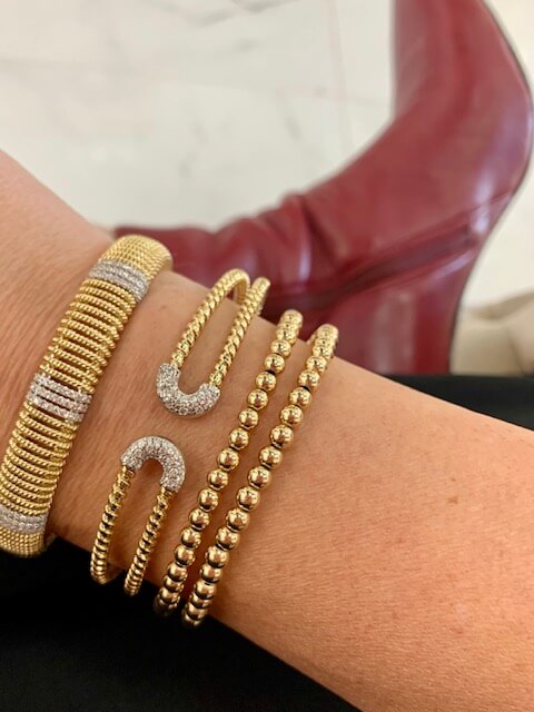 gold bangles and cuffs