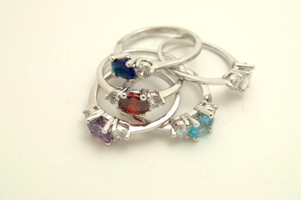 Five dainty birthstone rings