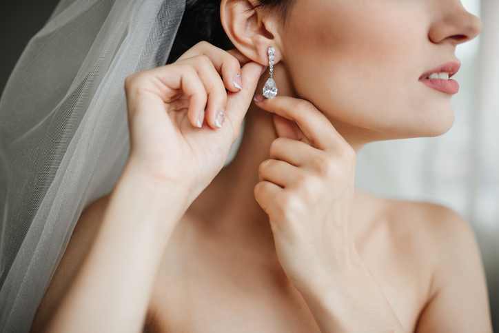 Wedding jewelry, bride with diamond earrings